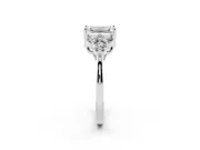 Emerald Cut Diamond Solitaire Ring Set in Silver with Cluster Accents on Each Side
