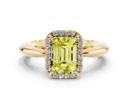Fancy Yellow Emerald Cut Diamond Halo Engagement Ring Set in Yellow gold with Plain Split Shank and Prong Setting