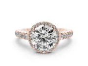 Round Cut Diamond Halo Engagement Ring Set in Rose gold with Pavé Band and Prong Setting