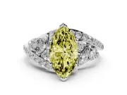 Fancy Yellow Marquise Cut Diamond Halo Ring Set in White gold with Marquise and Pavé Band in Prong Setting
