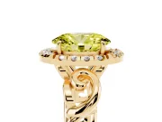 Fancy Yellow Oval Cut Diamond Halo Ring Set in Yellow gold with Scrollwork Band and Prong Setting