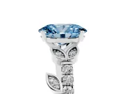 Fancy Blue Oval Cut Diamond Solitaire Leaf-Inspired Ring Set in Platinum with Pavé Band and Prong Setting