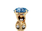 Fancy Blue Round Cut Diamond Milgrain Leaf Band Solitaire Ring Set in Yellow gold with Accent Stones and Prong Setting