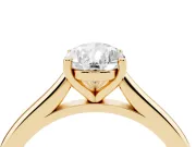Pear Cut Diamond Solitaire Ring Set in Yellow gold with Cathedral Band and Prong Setting