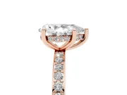 Pear Cut Diamond Pavé Band Ring Set in Rose gold with Prong-Set Center Stone