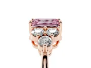 Fancy Pink Emerald Cut Diamond Solitaire Ring Set in Rose gold with Cluster Accents on Each Side