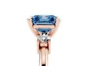 Fancy Blue Three-Stone Asscher Cut Diamond Ring Set in Rose gold with Prong Setting and Plain Band