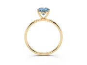 Fancy Blue Oval Cut Diamond Solitaire Engagement Ring Set in Yellow gold with Thin Band and Prong Setting