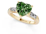 Fancy Green Heart Cut Diamond Solitaire Ring Set in Yellow gold with Tapered Baguette Side Stones and Prong Setting