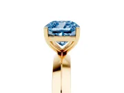 Fancy Blue Cushion Cut Diamond Solitaire Engagement Ring Set in Yellow gold with Flat Band and Prong Setting