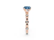 Fancy Blue Heart Cut Diamond Solitaire Ring Set in Rose gold with Bezel-Set Accents on Beaded Band and Prong Setting