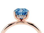 Fancy Blue Cushion Cut Diamond Solitaire Engagement Ring Set in Rose gold with Prong Setting and Polished Band