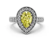 Fancy Yellow Pear Cut Diamond Halo Ring Set in Platinum with Round Accent Halo, Pavé Band and Prong Setting
