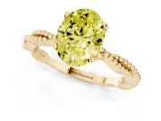 Fancy Yellow Oval Cut Diamond Solitaire Ring Set in Yellow gold with Twisted Band and Bead Prong Setting