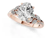 Oval Cut Diamond Solitaire Ring Set in Rose gold with Marquise Twist Band and Prong Setting
