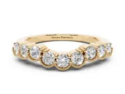 Round Diamond Bezel Half Eternity Band Set in Yellow gold with Plain Lower Shank