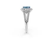 Fancy Blue Emerald Cut Diamond Halo Split Shank Engagement Ring Set in Silver with Prong-Held Center Stone