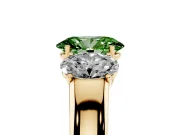 Fancy Green Three-Stone Oval Cut Diamond Ring Set in Yellow gold with Matching Prong Settings and Plain Band