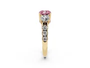 Cushion Cut Three Stone Engagement Ring Setting for a Fancy Pink Lab-Grown Diamond | Accented Shoulders | Yellow Gold