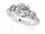 Cushion Cut Diamond Three-Stone Ring Set in Silver with Round Side Stones and Delicate Pavé Band