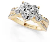 Three-Stone Heart Cut Diamond Twist Band Ring Set in Yellow gold with Pavé Accents and Prong Setting