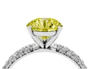 Fancy Yellow Round Cut Diamond Solitaire Ring Set in White gold with Prong Setting and Pavé-Set Band