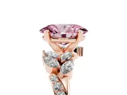 Fancy Pink Oval Cut Diamond Solitaire Ring Set in Rose gold with Marquise Twist Band and Prong Setting