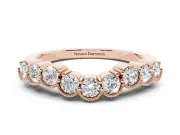 Round Diamond Bezel Half Eternity Band Set in Rose gold with Plain Lower Shank