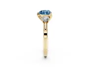 Heart-Shaped Hidden Halo Three Stone Engagement Ring Setting for a Fancy Blue Lab-Grown Diamond | Yellow Gold