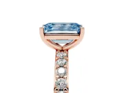 Fancy Blue Emerald Cut Diamond Solitaire Set in Rose gold with Round Pavé Band and Prong Setting