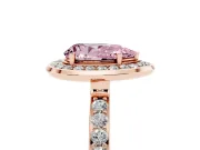 Fancy Pink Pear Cut Diamond Halo Ring Set in Rose gold with Bezel Frame and Pavé Band