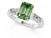 Fancy Green Emerald Cut Diamond Solitaire Ring Set in White gold with Tapered Baguette Side Stones and Prong Setting