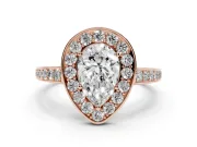Pear Cut Diamond Halo Pavé Engagement Ring Set in Rose gold with Bezel Setting