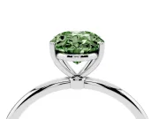 Fancy Green Oval Cut Diamond Solitaire Engagement Ring Set in White gold with Thin Band and Prong Setting