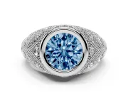 Fancy Blue Round Cut Diamond Bezel Ring Set in Silver with Milgrain Accent Band
