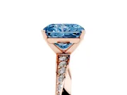 Fancy Blue Radiant Cut Diamond Engagement Ring Set in Rose gold with Side Stone Accents and Prong Setting