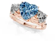 Heart-Shaped Three Stone Engagement Ring Setting for a Fancy Blue Lab-Grown Diamond | Braided Band | Rose Gold