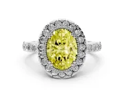 Fancy Yellow Oval Cut Diamond Halo Ring Set in Silver with Pavé Shank and Prong Setting