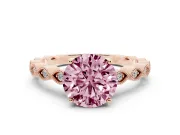Fancy Pink Round Cut Diamond Solitaire Ring Set in Rose gold with Infinity Twist Pavé Band