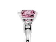 Fancy Pink Three-Stone Princess Cut Diamond Ring Set in White gold with Prong Setting and Plain Band