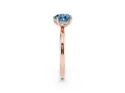 Fancy Blue Heart Cut Diamond Solitaire Ring Set in Rose gold with Thin Band and Prong Setting