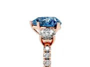 Fancy Blue Heart Cut Diamond Three-Stone Ring Set in Rose gold with Pavé Band and Graduated Sides