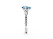 Fancy Blue Three-Stone Pear Cut Diamond Pavé Band Ring Set in White gold with Prong Setting