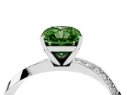 Fancy Green Radiant Cut Diamond Engagement Ring Set in Platinum with Side Stone Accents and Prong Setting