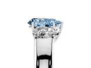 Fancy Blue Three-Stone Pear Cut Diamond Ring Set in Platinum with Matching Prong Settings and Plain Band
