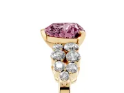 Fancy Pink Heart Cut Diamond Cluster Engagement Ring Set in Yellow gold with Pavé Band and Prong Setting