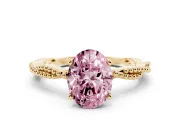 Fancy Pink Oval Cut Diamond Solitaire Ring Set in Yellow gold with Twisted Band and Bead Prong Setting