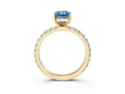 Fancy Blue Radiant Cut Diamond Pavé Solitaire Ring Set in Yellow gold with Round Band and Prong Setting