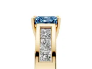 Fancy Blue Asscher Cut Diamond Solitaire Ring Set in Yellow gold with Channel-Set Accent Stones and Prong Setting