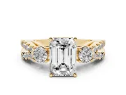 Emerald Cut Diamond Three-Stone Ring Set in Yellow gold with Pavé Split Shank and Prong Setting